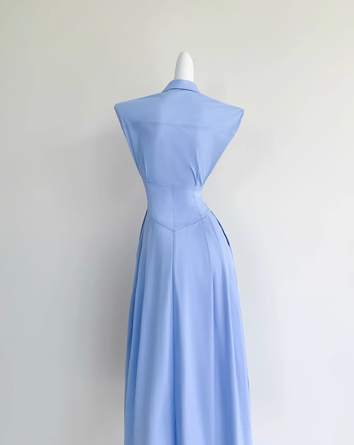 Sleeveless blue shirt dress