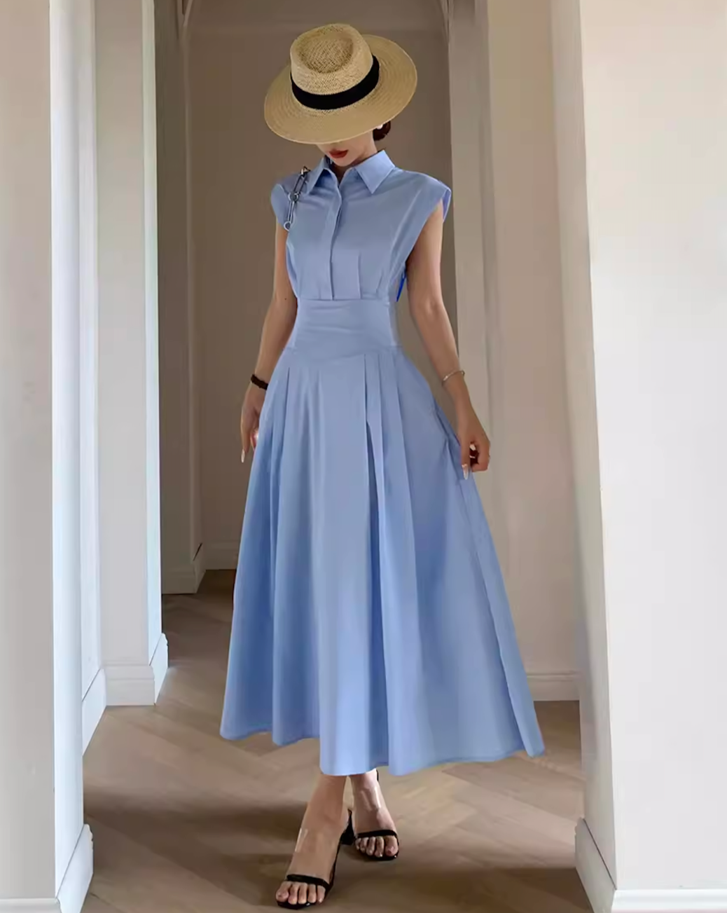 Sleeveless blue shirt dress