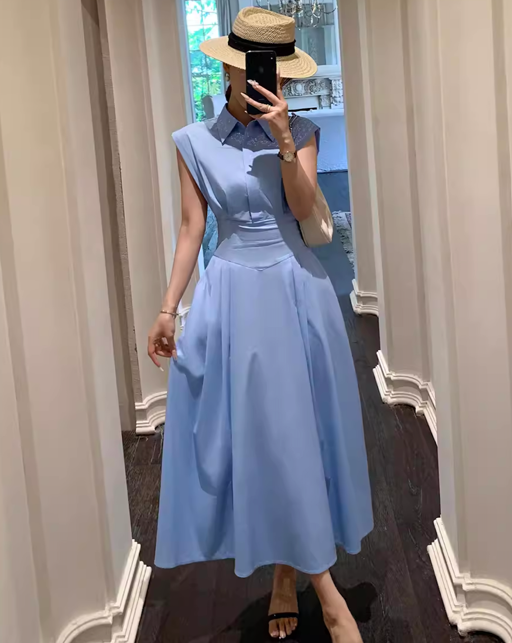 Sleeveless blue shirt dress