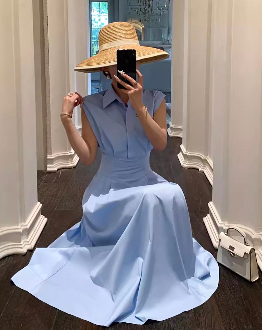 Sleeveless blue shirt dress